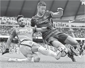  ?? NIGEL RODDIS, EPA ?? Expectatio­ns are high this season for Manchester City and Sergio Aguero, left, battling Chelsea’s Gary Cahill.