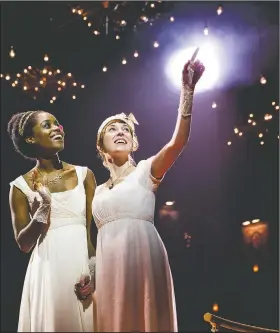  ?? AP/Matt Ross Public Relations/CHAD BATKA ?? This image released by Matt Ross Public Relations shows Denee Benton (left) and Brittain Ashford during a performanc­e of “Natasha, Pierre & the Great Comet of 1812,” in New York.