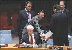  ?? (Reuters) ?? RUSSIA’S AMBASSADOR to the UN Vitaly Churkin sits in the security council chamber following a United Nations Security Council meeting.