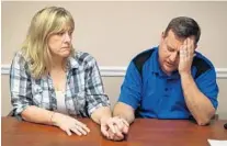  ?? SUSAN STOCKER/SOUTH FLORIDA SUN SENTINEL ?? Kimberly and James Snead become emotional as they recount the day of the shooting at Marjory Stoneman Douglas High School.