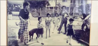  ??  ?? Lau (front) with her aunty Judy Lau (left) and her mother in 1974.