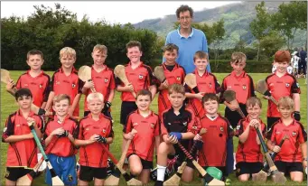  ??  ?? The Kilgarvan Kenmare Hurling team who won the Dr Bill Mangan Memorial Plate at the Dr Bill Mangan Memorial Hurling Tournament in the Muckross Traditiona­l Farms field Killarney on Saturday. Photo by Michelle Cooper Galvin