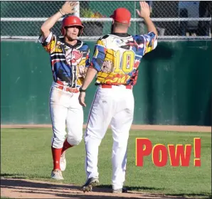  ?? NEWS PHOTO RYAN MCCRACKEN ?? Medicine Hat Mavericks outfielder David Salgueiro gets a high five from teammate Johnathan Smithey (10) after scoring a run in Saturday's Western Major Baseball League game against the Fort McMurray Giants at Athletic Park. The Mavericks were sporting special jerseys for Superhero Night.