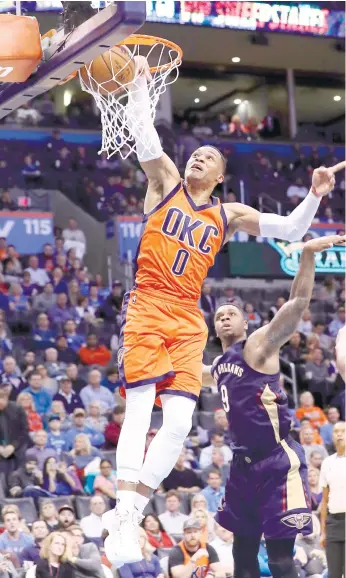  ?? (AP FOTO) ?? FIRST SINCE MJ. Russel Westbrook had 28 points, 17 rebounds and 12 assists for his fifth straight triple double, the first NBA player to do so since Michael Jordan in 1989.