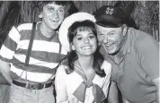  ?? AP, file 1965 ?? Dawn Wells poses with fellow ‘Gilligan's Island’ cast members Bob Denver, left, and Alan Hale Jr.