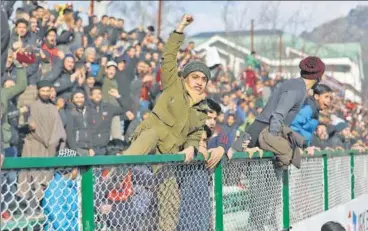  ?? HT PHOTOS ?? (Clockwise from above) A young fan at the TRC Ground watches Real Kashmir in action; women too turn up in numbers.