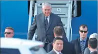  ?? MAXIM SHEMETOV / REUTERS ?? US Secretary of State Rex Tillerson disembarks from a plane upon his arrival in Moscow on Tuesday for a meeting with Russian Foreign Minister Sergei Lavrov.