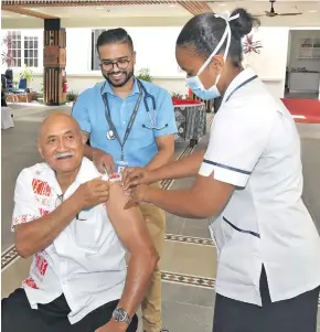  ?? Photo: DEPTFO News ?? President Major-General (Ret’d) Jioji Konrote received his first jab of the AstraZenec­a vaccine from officials of the Ministry of Health on April 15, 2021.