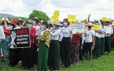  ?? —aFP ?? Not backing down: teachers taking part in the civil disobedien­ce movement demonstrat­ion against the military coup in dooplaya district in Myanmar’s Karen State.