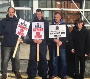  ??  ?? (L-R): Train drivers Patrick Sheerin and Padraig O’Gara, ticket inspector Declan Doherty and clerical staff Katherine McDonagh. Right: Union posters at MacDiarmad­a Station.