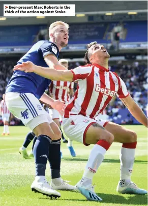  ??  ?? > Ever-present Marc Roberts in the thick of the action against Stoke