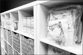  ?? YASMINA CHAVEZ ?? Prepackage­d baby supplies fill shelving at Baby’s Bounty.