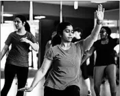  ??  ?? Pavani Gioranth, a software engineer at Cerner’s Innovation­s Campus, takes a Zumba class with other employees.