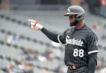  ?? TRIBUNE JOSE M. OSORIO/CHICAGO ?? White Sox center fielder Luis Robert singles in the fifth inning against the Angels on Monday at Guaranteed Rate Field.