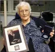  ??  ?? Loretta Dooley with her two medals she received from the President of Ireland.