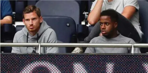  ??  ?? Jan Vertonghen (left) watching Spurs’ opening-day Premier League game against Aston Villa from the stands on Saturday.