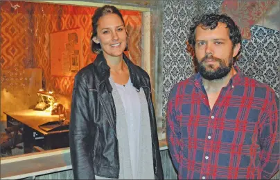  ?? DAVE STEWART/THE GUARDIAN ?? Jessica Caseley, vice-president of marketing for Maritime Fun Group, and Adam Hickey, vice-president of Maritime Fun Group, stand beside the check-in counter for the Route 6 Motel in Cavendish, ready to welcome the brave souls who stop by during the...