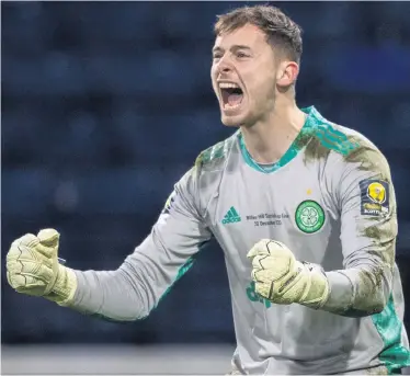  ?? GETTY ?? Hero:
Celtic’s Conor Hazard celebrates after making a crucial penalty save in the Scottish Cup final
