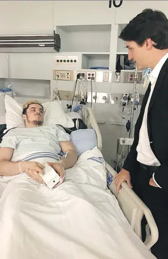  ??  ?? Humboldt Broncos bus crash survivor Ryan Straschnit­zki, visited by Prime Minister Justin Trudeau two days after the April 6 collision, has no feeling below his chest but is getting support in his determinat­ion to continue in sport.