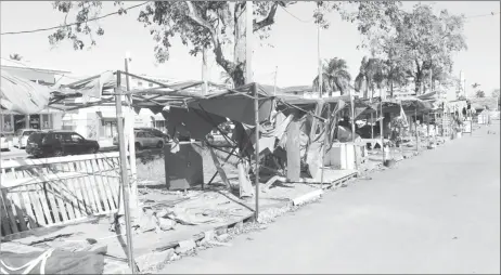  ?? George) (Photo by Keno ?? Some of the tents that were destroyed and left unattended along the Merriman Mall.