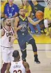  ?? THE ASSOCIATED PRESS ?? Golden State Warriors guard Stephen Curry (30) drives past Cleveland Cavaliers forward Kevin Love (0) during the first half of Game 2 of the NBA Finals on Sunday in Oakland, Calif.