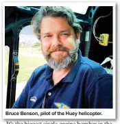  ??  ?? Bruce Benson, pilot of the Huey helicopter.