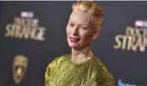  ?? JORDAN STRAUSS/THE ASSOCIATED PRESS ?? Doctor Strange director Scott Derrickson, above left, rewrote the character of Wong, played by Benedict Wong. The casting of Tilda Swinton as the Ancient One has led to some criticism.