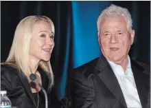  ?? FRANK GUNN THE CANADIAN PRESS FILE PHOTO ?? Magna Internatio­nal Inc. chairman Frank Stronach (right) and executive vice-chair Belinda Stronach chat at the company’s AGM in 2010.