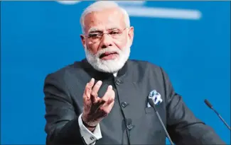  ?? DMITRY LOVETSKY/AP PHOTO ?? India’s Prime Minister Narendra Modi addresses the St. Petersburg Internatio­nal Economic Forum in St. Petersburg, Russia, earlier this month.