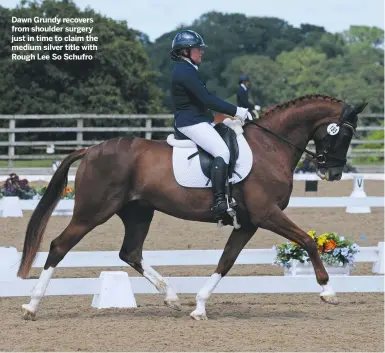  ??  ?? Dawn Grundy recovers from shoulder surgery just in time to claim the medium silver title with Rough Lee So Schufro