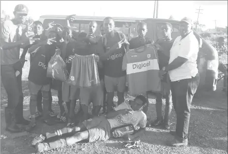  ??  ?? Vryman’s Erven captain Atua Austin, collects the zone winner uniforms from Digicel representa­tive Otrain Bowen following their win over Berbice Educationa­l Institute in the Region #6 final at the Burnham Park ground.