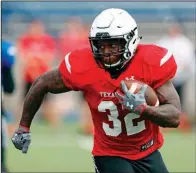  ?? AP/BRAD TOLLEFSON ?? Texas Tech’s Desmond Nisby participat­es in a spring scrimmage in Midland, Texas. Texas Tech has held at least one workout in Midland for the past six seasons.
