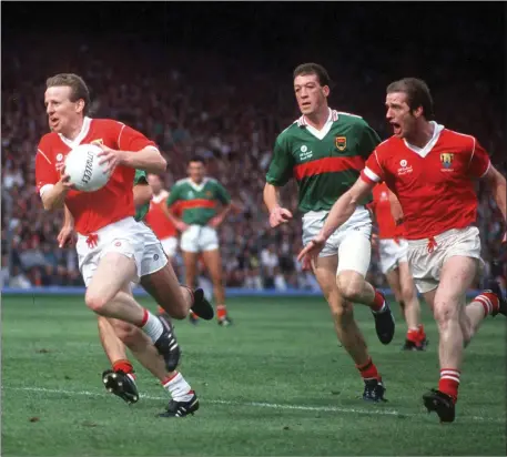  ??  ?? John Cleary of Cork in action against TJ Kilgallon of Mayo during the All-Ireland Senior Football Championsh­ip Final between Cork and Mayo at Croke Park on September 17th 1989. Cork won by 0-17 to 1-11. Pic: Ray McManus/SPORTSFILE.