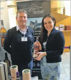  ??  ?? Kate Forbes MSP with Iain Hector, visitor experience manager at the Raasay Distillery, at the whisky event last week at the Scottish Parliament.