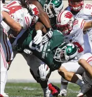  ?? KIRTHMON F. DOZIER / DETROIT FREE PRESS FILE ?? “You just can’t keep doing the same thing. The guys we have here, I think we’re good guys. We know what’s right from wrong,” says Spartans running back LJ Scott.