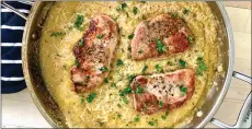  ?? A LITTLE YUMMINESS ?? This easy, hearty dinner goes in the oven, letting you relax with friends and family while the pork chops and polenta finish on their own.