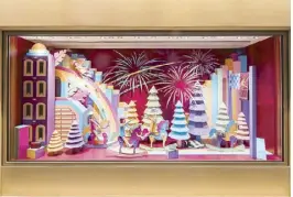  ??  ?? Paper town: French artists Zim & Zou render Hong Kong’s iconic skyline in colorful paper for the main shop window of Hermès Landmark Prince’s.