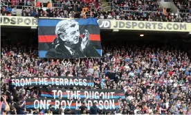  ??  ?? Crystal Palace fans show their support for Roy Hodgson in 2018. Photograph: Christophe­r Lee/Getty Images