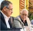  ?? RICARDO MAKYN/ MULTIMEDIA PHOTO EDITOR ?? Paul Abrahams (left), managing director, JUTC, addressing the media, while Minister of Transport and Mining Mike Henry looks on at a press conference to discuss the JUTC and the Transport Authority, last week.