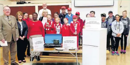  ??  ?? Around 90 walkers, promised £4,000 in sponsorshi­p, tied up their trainers and tackled up to 12km in a bid to raise money for a family stranded in a Greek refugee camp as part of Christian Aid week. Pictured, far left, are the former Mayor and Mayoress...