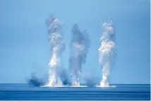  ?? AP ?? MK-82 low-drag general-purpose bombs are dropped by F-CK-1 fighters, Taiwan’s indigenous defence fighter, during the annual Han Kuang exercises.