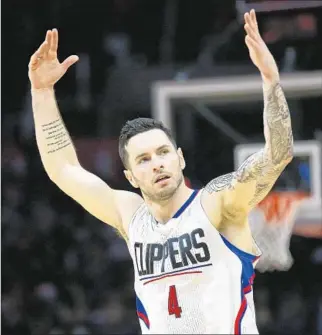  ?? Rick Loomis
Los Angeles Times ?? CLIPPERS guard J. J. Redick gestures after making one of his nine three- pointers during an overtime victory over Houston this week. Redick scored 40 points in the game.