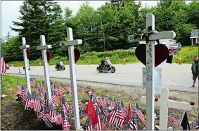  ?? PAUL HAYES/CALEDONIAN-RECORD VIA AP, FILE ?? In this July 6, 2019, file photo, motorcycli­sts participat­e in a ride in Randolph, N.H., to remember seven bikers killed there in a collision with a pickup truck in June. State transporta­tion officials in Massachuse­tts were to be questioned during a legislativ­e oversight hearing on Monday in Boston about the Registry of Motor Vehicles’ failure to suspend the commercial license of the truck driver charged in the crash that killed the seven motorcycli­sts in New Hampshire.