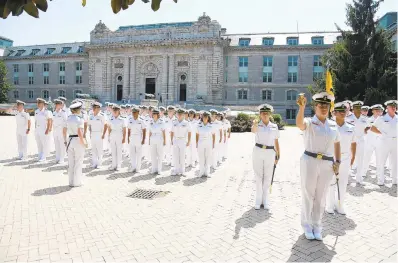  ?? PHOTOS BY PAULW. GILLESPIE/CAPITAL GAZETTE ?? Fourth class midshipmen line up under the watchful eye of their upper class detailers in Tecumseh Court for noon meal formation before being released for the weekend as the Naval Academy Class of 2022 reunited with their families for Plebe Parents’Weekend.