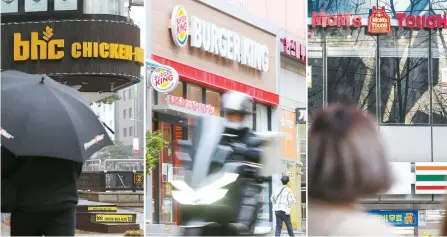  ?? Newsis ?? From left are stores of bhc, Burger King and Mom’s Touch in Seoul.