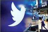  ?? ?? The logo for Twitter appears above a trading post on the floor of the New York Stock Exchange. (AP)