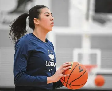  ?? Erica Denhoff/Icon Sportswire via Getty Images ?? UConn’s Jana El Alfy participat­es in the pregame shoot around at Providence on Feb. 1.