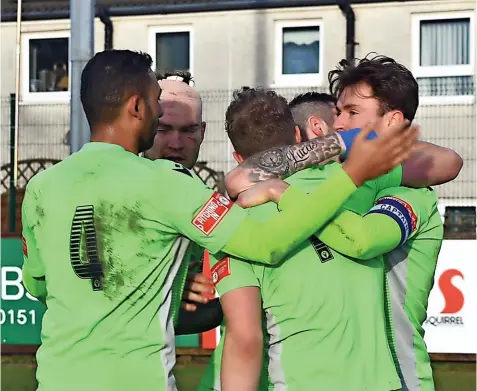  ?? ?? Leek Town celebrate the crucial winning Billy Reeves strike at Prescot Cables on Saturday. Photo by Luke Reynolds