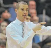  ?? MARY BETH NOLAN/ FOR THE SUN- TIMES ?? After 18 seasons as Marist’s head basketball coach, Gene Nolan, 44, is heading to Naperville North to coach the Huskies.