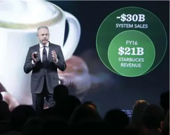  ?? RICHARD DREW/THE ASSOCIATED PRESS ?? Starbucks COO Kevin Johnson speaks at the company’s 2016 Investor Day meeting in New York on Wednesday.